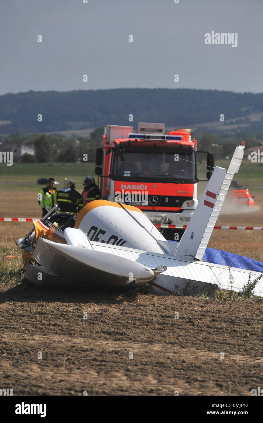 Two men did not survive the accident of a small Austrian plane that probably crashed during landing at the grassy airport in Dolni Benesov-Zabreh, North Moravia, Czech Republic on August 16, 2012 (CTK Photo/Jaroslav Ozana) Stock Photo