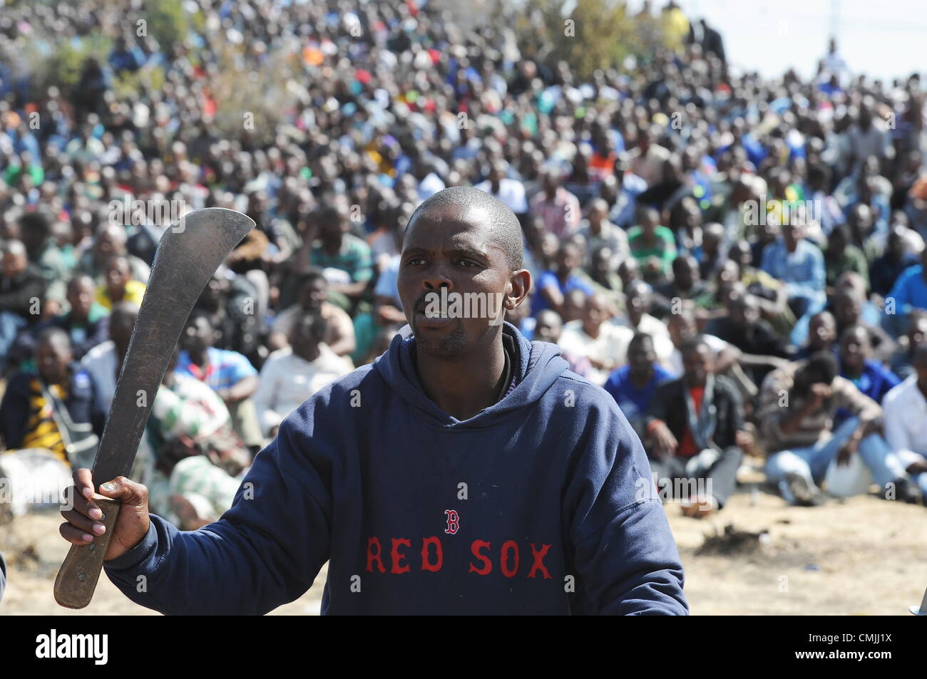 16th Aug 2012. RUSTENBURG, SOUTH AFRICA Mine workers carry dangerous