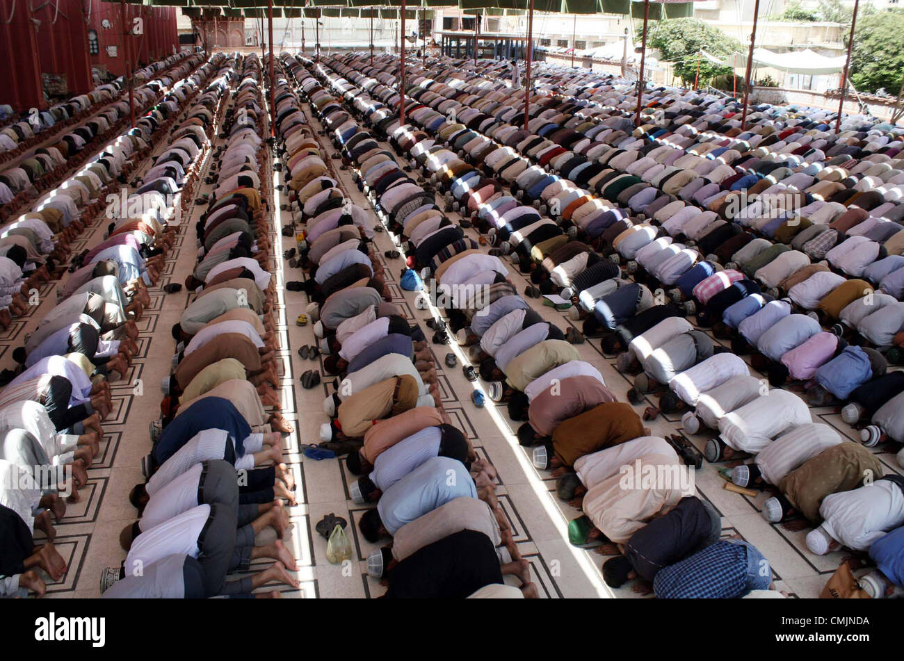 Faithful Muslims offer Friday Prayer at a Memon mosque during the Last