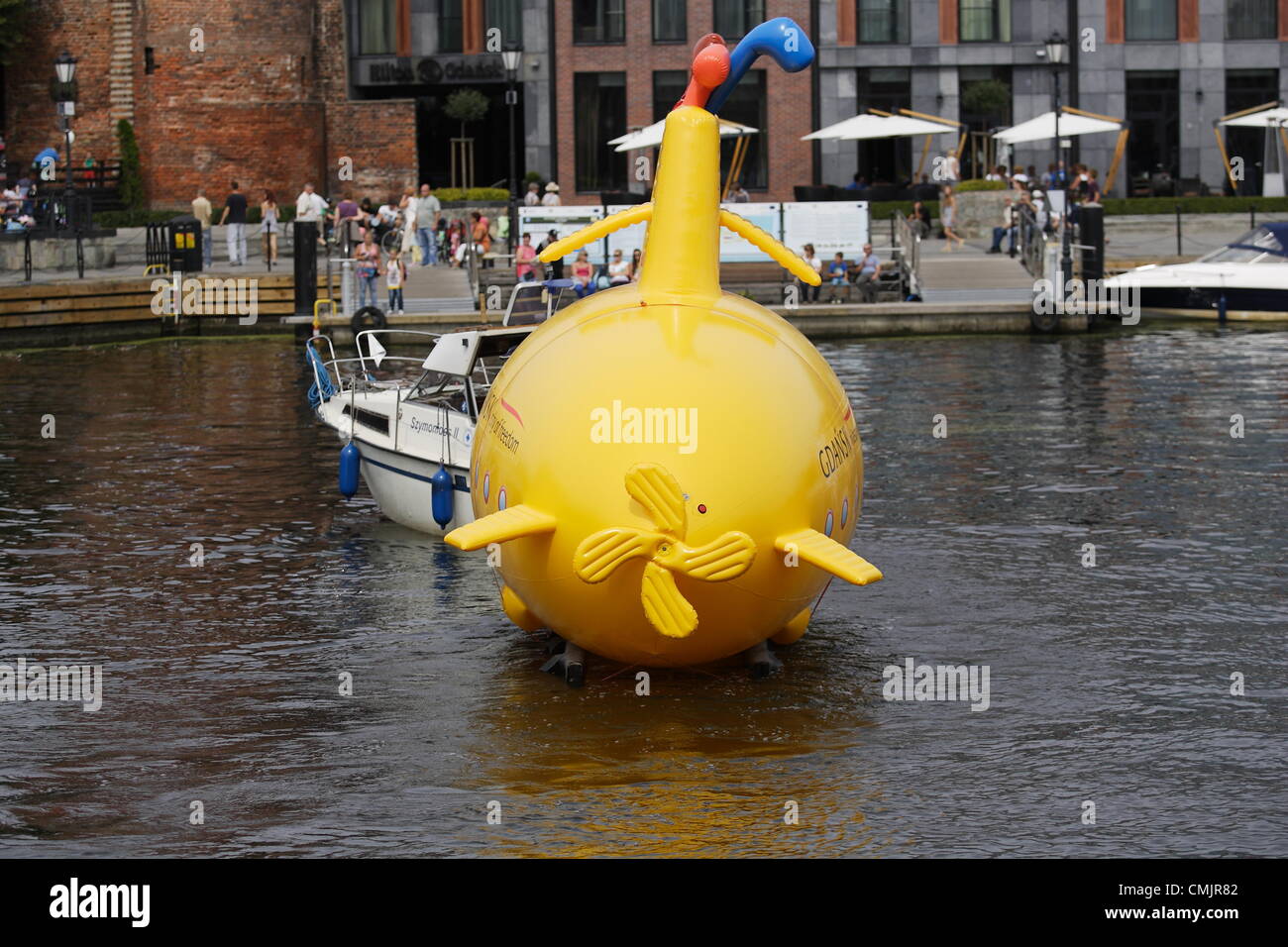 Gdansk, Poland 18th, August 2012 Yellow Submarine on the Motlawa River. Performance organised in the 50th anniversary of the first The Beatles concert with historical band members. Yellow Submarine is one of the events of the 'Week of the Legend - Gdansk's The Beatles jubilee'. Stock Photo