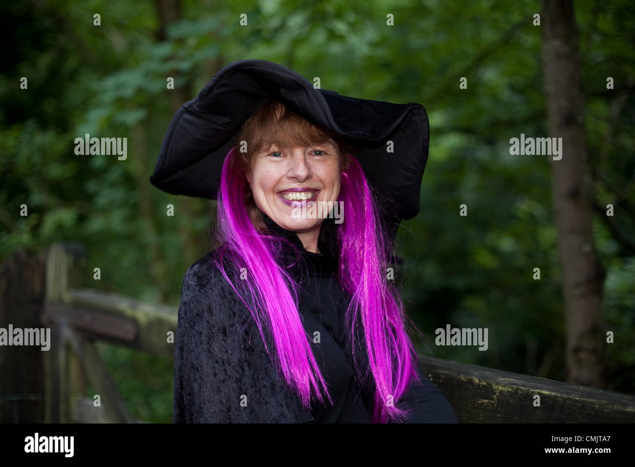 Lancashire, UK. Saturday, August 18th 2012.  Janice Quinliven at the Big Witch Event Barley, in the borough of Pendle, in Lancashire, England.  Official Guinness World Record attempt at “the largest gathering of people dressed as witches on Saturday 18th August, 2012 raising funds for Pendleside Hospice on the occasion of the 400th anniversary of the Pendle Witch Trials. Stock Photo