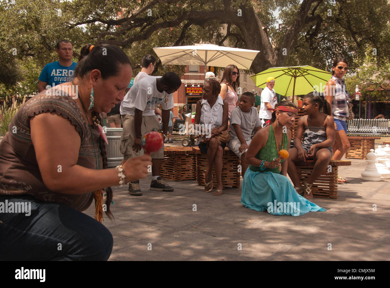 18 August 2012 San Antonio, Texas, USA - Native Americans from the Pacuache-Tilijaya Coahuilteca Tribe of Tejas, perform a traditional dance at Alamo Plaza in front of the Alamo. Stock Photo