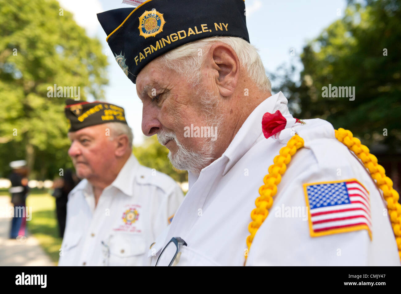 Aug. 18, 2012 - Farmingdale, New York, U.S.: (L-R) BOB FULLAM, of Veterans of Foreign Wars of U.S. Post 516 and District One Commander, and PHIL STREHL, Vice Commander of Farmingdale Post 449 of American Legion, are among hundreds who attend the burial ceremony of Marine Lance Corporal Greg Buckley Jr, 21 - the Oceanside native killed in Afghanistan 9 days earlier - at Long Island National Cemetery. Stock Photo