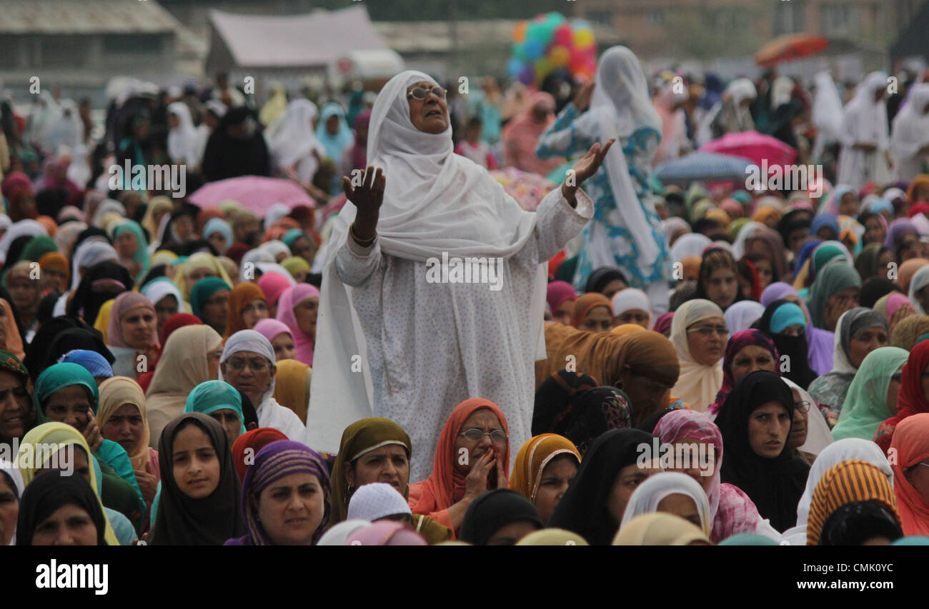 Aug. 20, 2012 - A Kashmiri Muslim women rise hands during prayers on ...