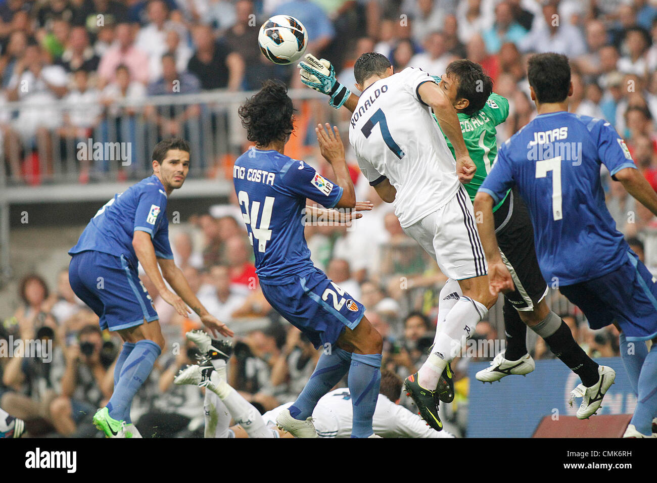 19.08.2012 Madrid, Spain. La Liga Football Real Madrid vs. Valencia CF - Bruno Alves gets his hand to the ball on the cross Stock Photo