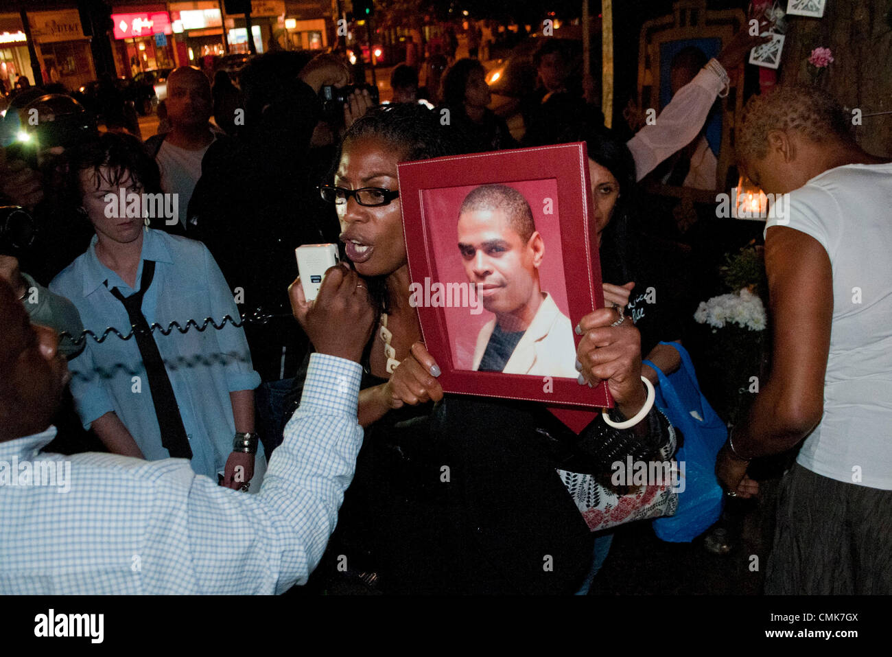 London, UK. 21/08/12. Marcia Rigg, sister of Sean Rigg who died whilst in police custody, speaks to members of the community, protesters and campaigners justice outside Brixton Police Station to hold a minutes silence. Stock Photo