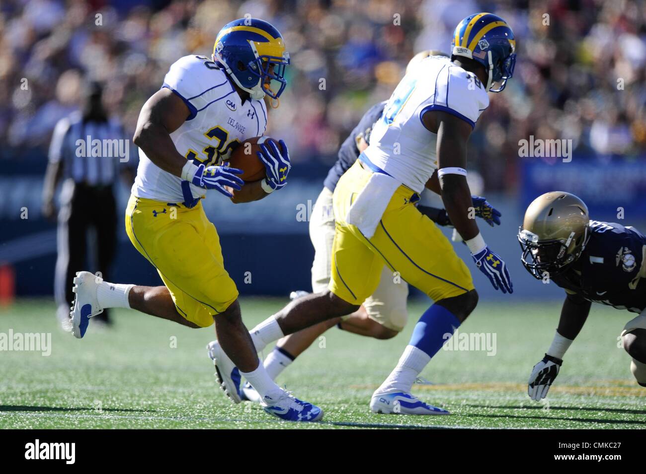 SEP 14, 2013 : Delaware Fightin Blue Hens running back Andrew Pierce (30) rushes during a match up between the Delaware Fightin Blue Hens and the Navy Midshipmen at the Navy-Marine Corps Memorial Stadium in Annapolis, MD. Stock Photo
