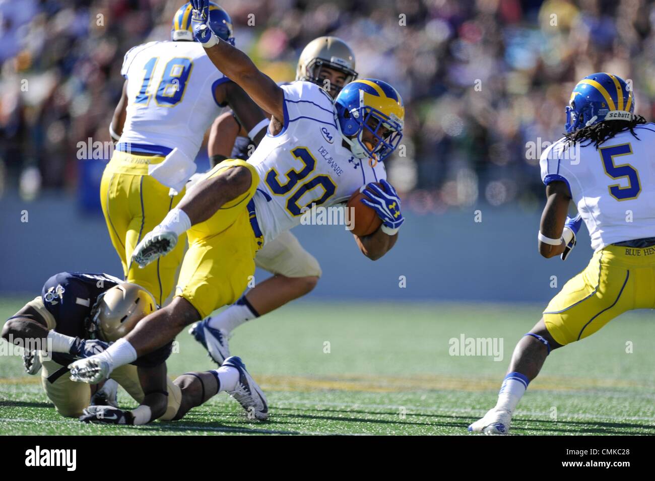 SEP 14, 2013 : Delaware Fightin Blue Hens running back Andrew Pierce (30) rushes during a match up between the Delaware Fightin Blue Hens and the Navy Midshipmen at the Navy-Marine Corps Memorial Stadium in Annapolis, MD. Stock Photo