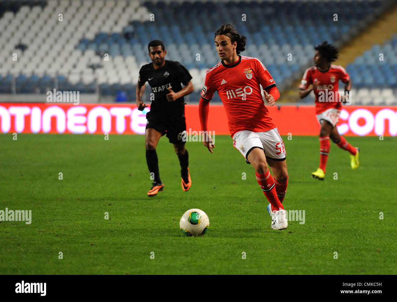 Serbian striker Lazar Markovic of Benfica runs with the ball during the portuguese Liga Zon Sagres football match between Academica and Benfica Stock Photo