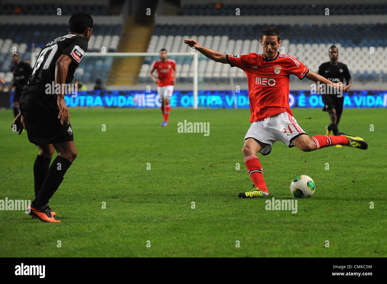 Sport Lisboa e Benfica Serbian midfielder Nemanja Matic shoots on goal during a Portuguese football league match against Academica de Coimbra Stock Photo