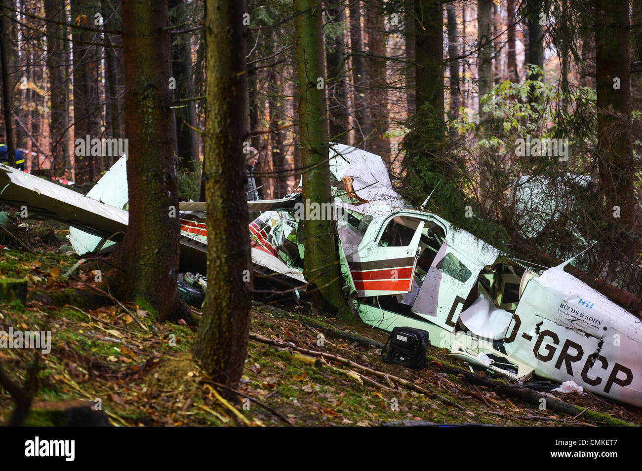 Cortendorf, Germany. 02nd Nov, 2013. The fuselage of a twin-engined aircraft after crashing into a forest in Cortendorf, Germany, 02 November 2013. Three people died in the crash. Photo: DAVID EBENER/dpa/Alamy Live News Stock Photo