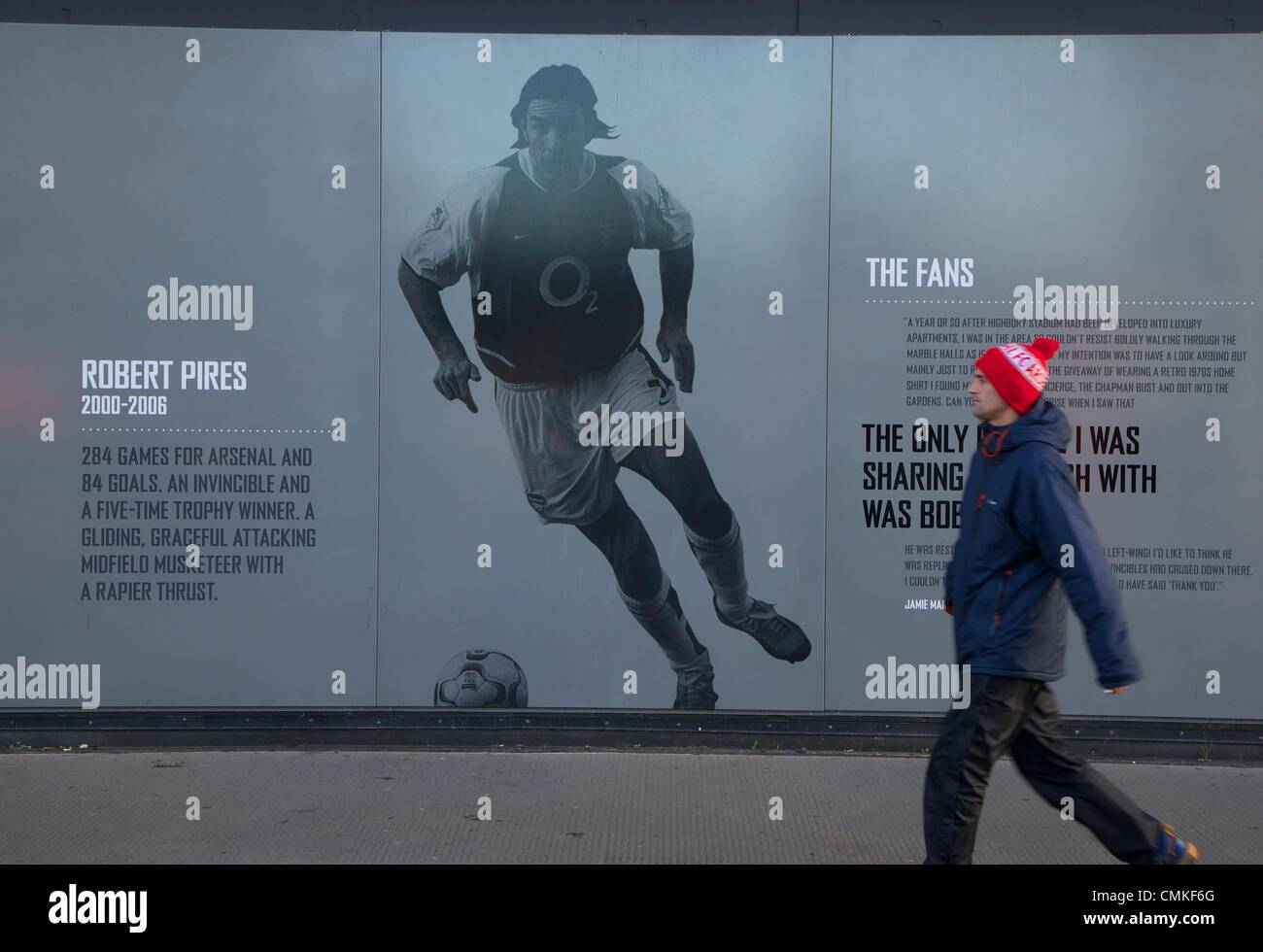 London, UK. 02nd Nov, 2013. Fan walking past picture of Arsenal hero Robert Pires before the Premier League game between Arsenal and Liverpool from the Emirates Stadium. Credit:  Action Plus Sports/Alamy Live News Stock Photo
