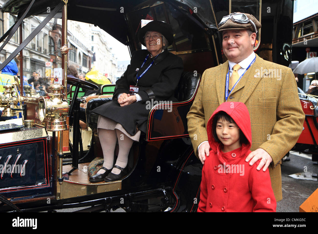 Participants in the Royal Automobile Club's annual London to Brighton Veteran Car Rally pose for photographs, London UK Stock Photo