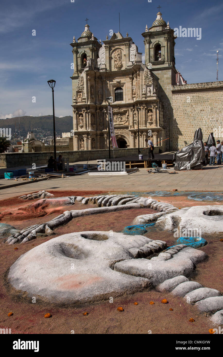 Elaborate sand sculptures of skeletons in front of the Solitude