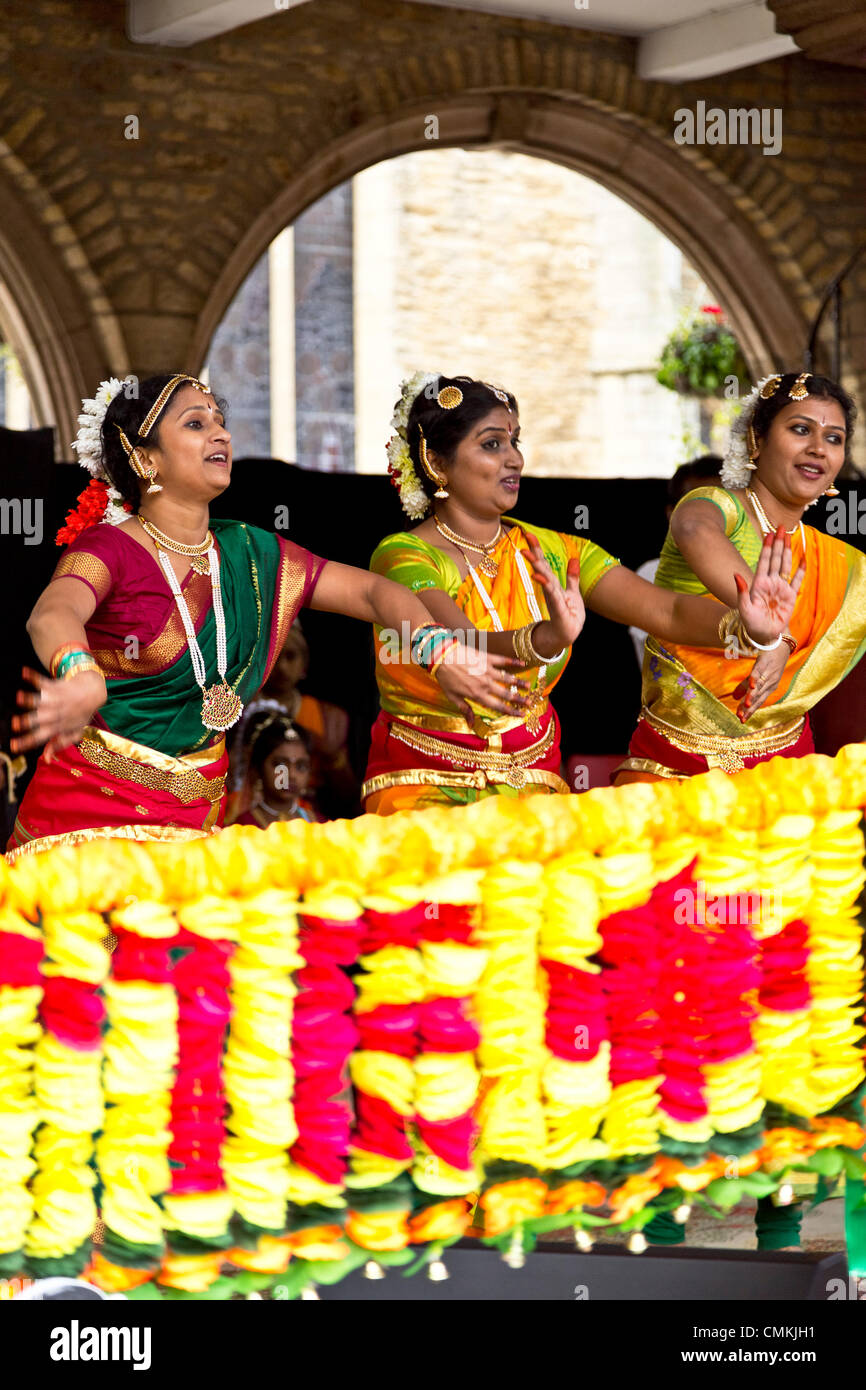 Female dancers performing a traditional Indian dance at the Diwali Festival 2nd November 2013 at the Guildhall, Cathedral Square, Peterborough, England Stock Photo