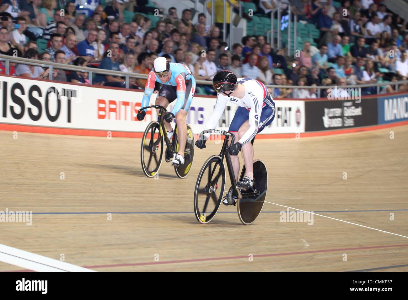 Track Cycling World Cup, National Cycling Centre, Manchester, UK. 3rd November 2013. Matt Crampton (GBR), right, beats Peter Lewis to reach the men's sprint quarter final Credit:  Neville Styles/Alamy Live News Stock Photo