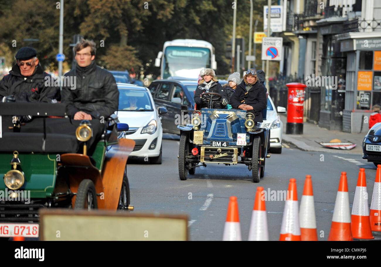 3rd Nov, 2013. Veteran cars get stuck in traffic as they near the finish in Brighton of the RAC London to Brighton Veteran Car Run Stock Photo