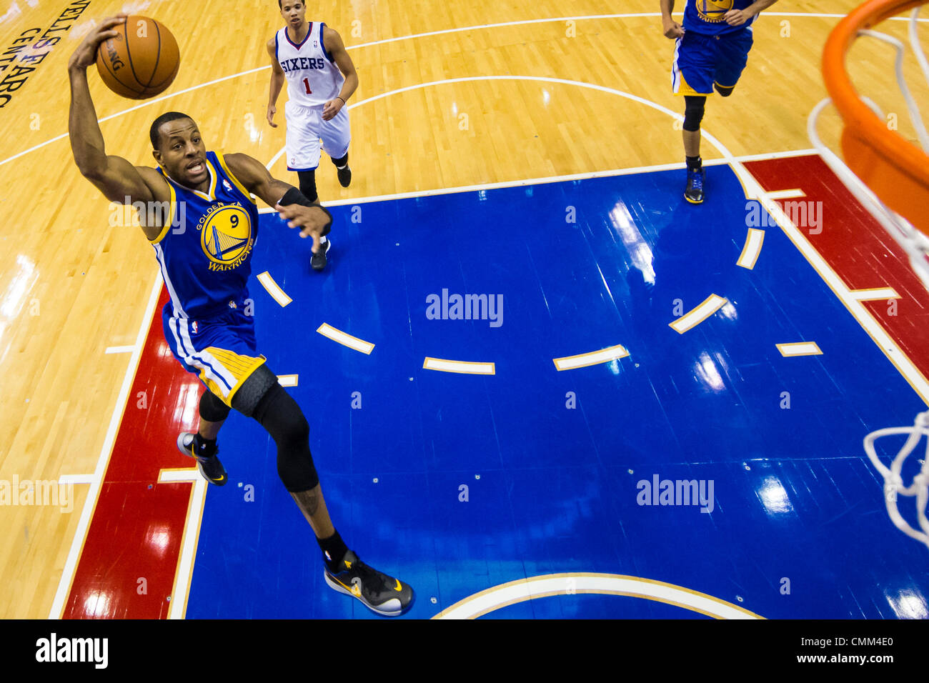 Philadelphia, Pennsylvania, USA. 4th Nov, 2013. Golden State Warriors shooting guard Andre Iguodala (9) goes for the dunk during the NBA game between the Golden State Warriors and the Philadelphia 76ers at the Wells Fargo Center in Philadelphia, Pennsylvania. The Warriors win 110-90. (Christopher Szagola/Cal Sport Media/Alamy Live News) Stock Photo
