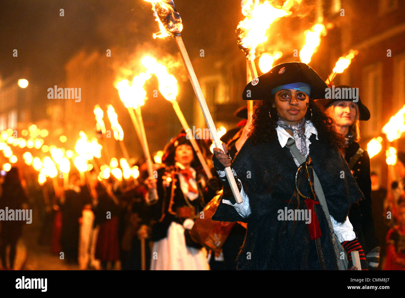 Lewes, East Sussex, UK. 5th Nov, 2013.  Torchlight procession through the streets of Lewes. Lewes bonfire night procession to celebrate the foiling of the 'Gunpowder plot' of 1605 Lewes, East Sussex, UK 5th November 2013 "Credit: CP/Alamy Live News" Stock Photo