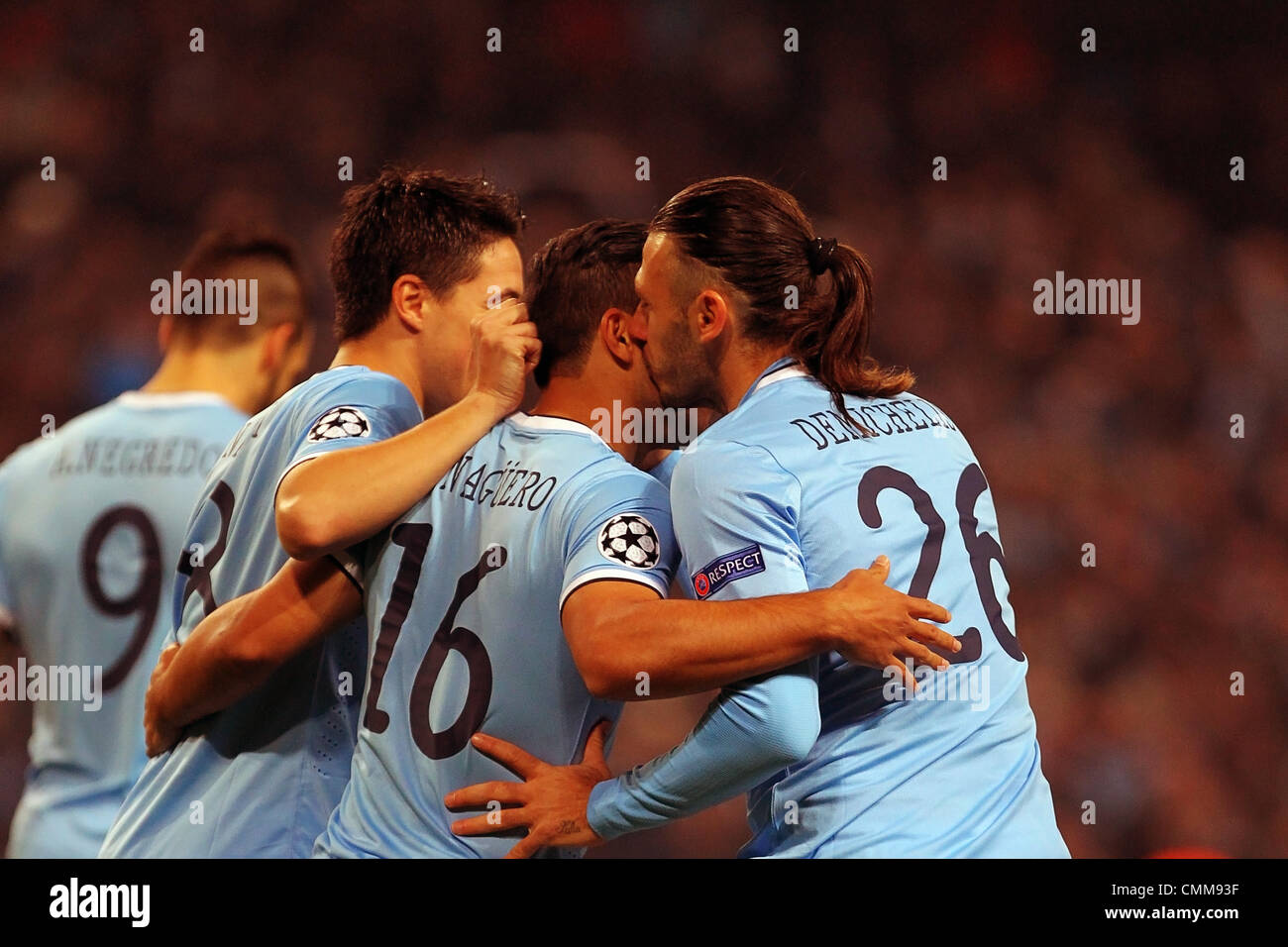 Manchester, UK. 05th Nov, 2013. DeMichaels gives Sergio Aguero of Manchester City a kiss for converting a penalty in the 3rd minute during the Champions League group D game between Manchester City and CSKA Moscow from the City of Manchester Stadium. Credit:  Action Plus Sports/Alamy Live News Stock Photo