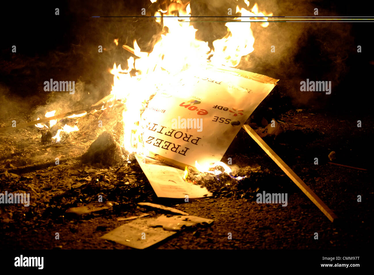 London, UK . 05th Nov, 2013. Protesters hold bonfire on Westminster bridge in front of parliament , burning fuel bills in protest against price rises and cuts. Credit:  Rachel Megawhat/17�Թ����� Live News Stock Photo