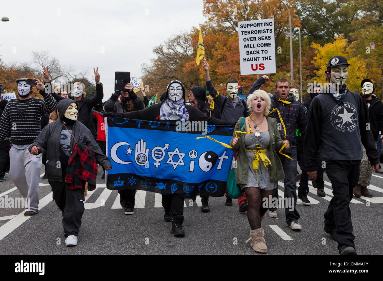 Washington, DC USA. 5th Nov, 2013.  Thousands of Anonymous members and supporters rally in Washington, DC, protesting against corporate greed and corrupt governments around the world. Credit:  B Christopher/Alamy Live News Stock Photo