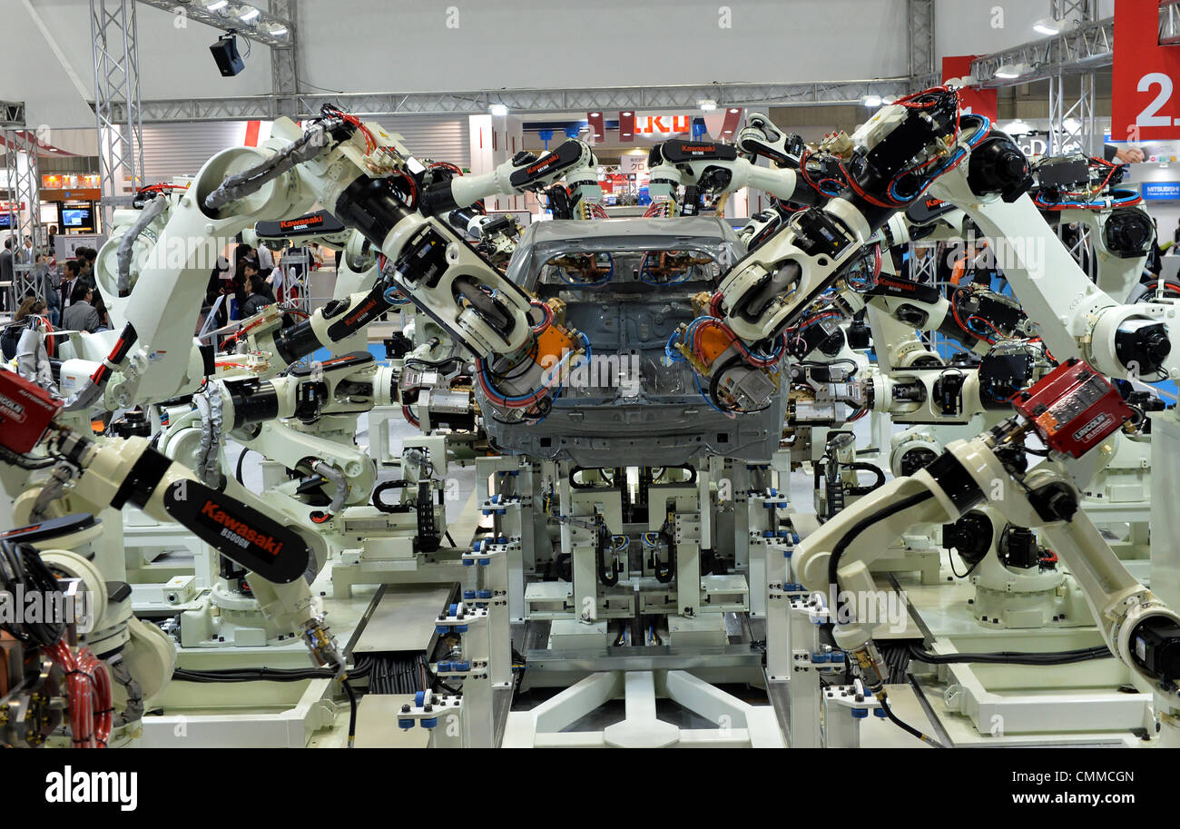 Tokyo, Japan. 6th Nov, 2013. Industrial robot arms are displayed at the  International Robot Exhibition opened in Tokyo on Wednesday, November 6,  2013. Engineers and manufacturers from home and abroad showcase industrial