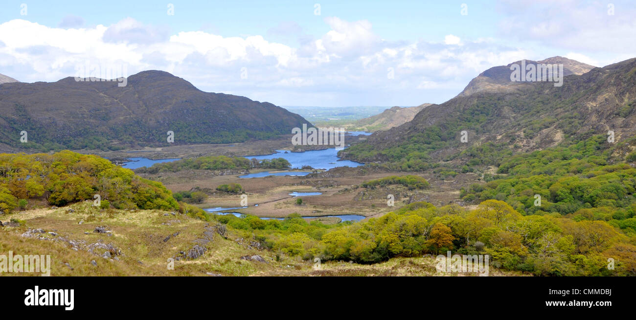 Ladies View is located between Kenmare and Killarney on the Ring of Kerry and in the heart of Killarney National Park, photo taken on May 27, 2013. The panorama of the three Lakes of Killarney and the mountains on either side was much admired by Queen Victoria’s ladies-in-waiting, when they stayed here during the royal visit in 1861, hence the name Ladies View. In 1981, the National Park was designated as a Biosphere Reserve by the UNESCO. Photo: Frank Baumgart Stock Photo