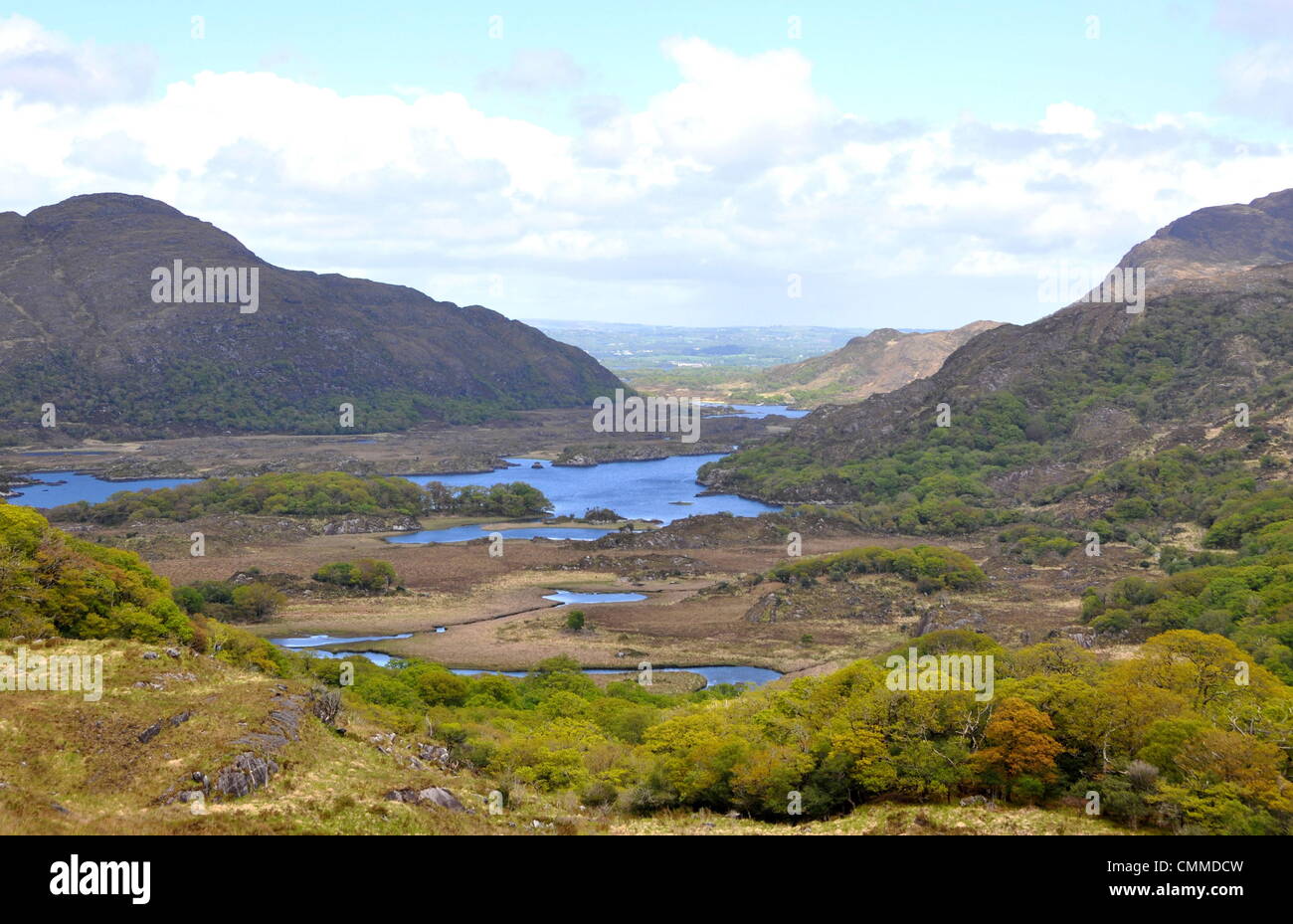Ladies View is located between Kenmare and Killarney on the Ring of Kerry and in the heart of Killarney National Park, photo taken on May 27, 2013. The panorama of the three Lakes of Killarney and the mountains on either side was much admired by Queen Victoria’s ladies-in-waiting, when they stayed here during the royal visit in 1861, hence the name Ladies View. In 1981, the National Park was designated as a Biosphere Reserve by the UNESCO. Photo: Frank Baumgart Stock Photo