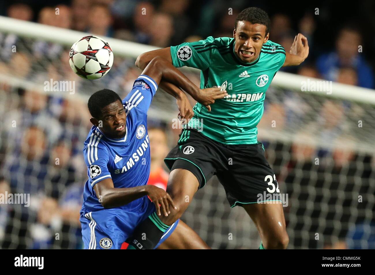 London, Britain. 06th Nov, 2013. Schalke's Joel Matip (R) and Samuel Eto'o (L) of Chelsea vie for the ball during the UEFA Champions League group E soccer match between Chelsea FC and FC Schalke 04 at Stamford Bridge Stadium in London, Britain, 06 November 2013. Photo: Friso Gentsch/dpa/Alamy Live News Stock Photo