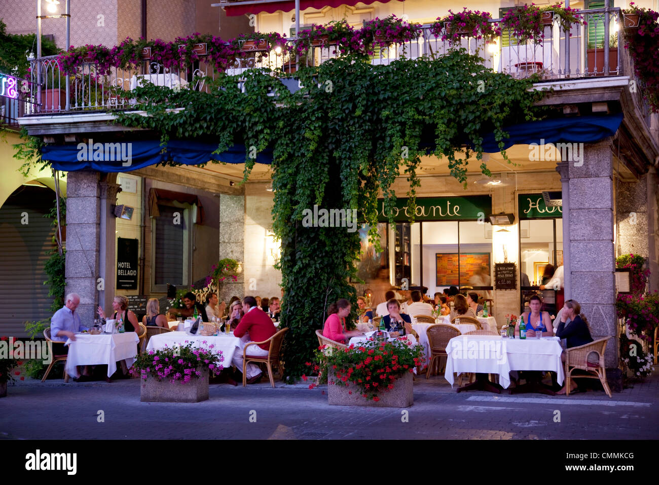 Town restaurant at dusk, Bellagio, Lake Como, Lombardy, Italy, Europe Stock Photo