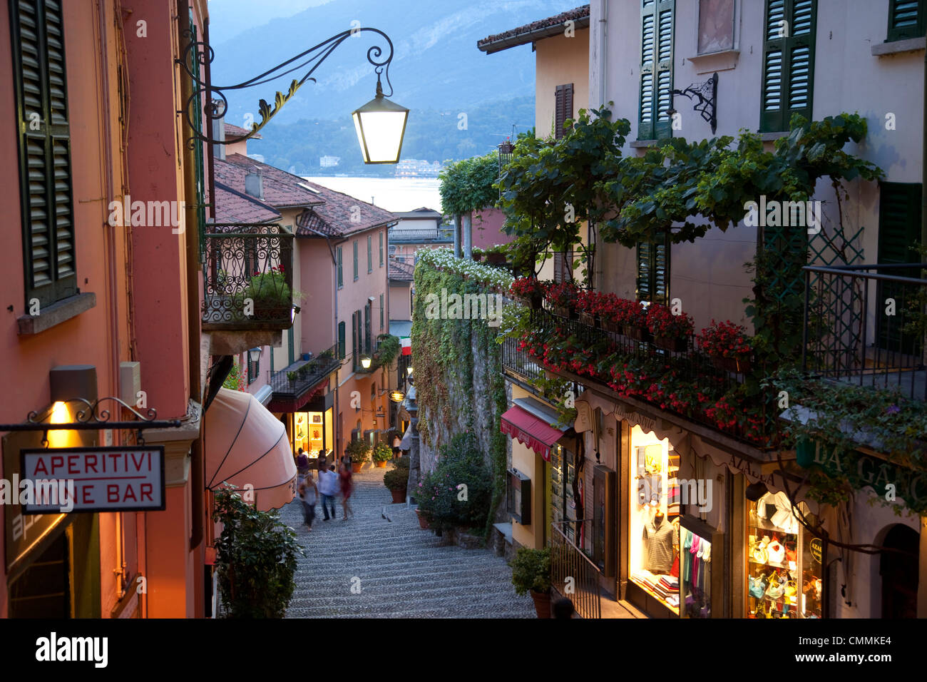 Shopping street at dusk, Bellagio, Lake Como, Lombardy, Italy, Europe Stock Photo
