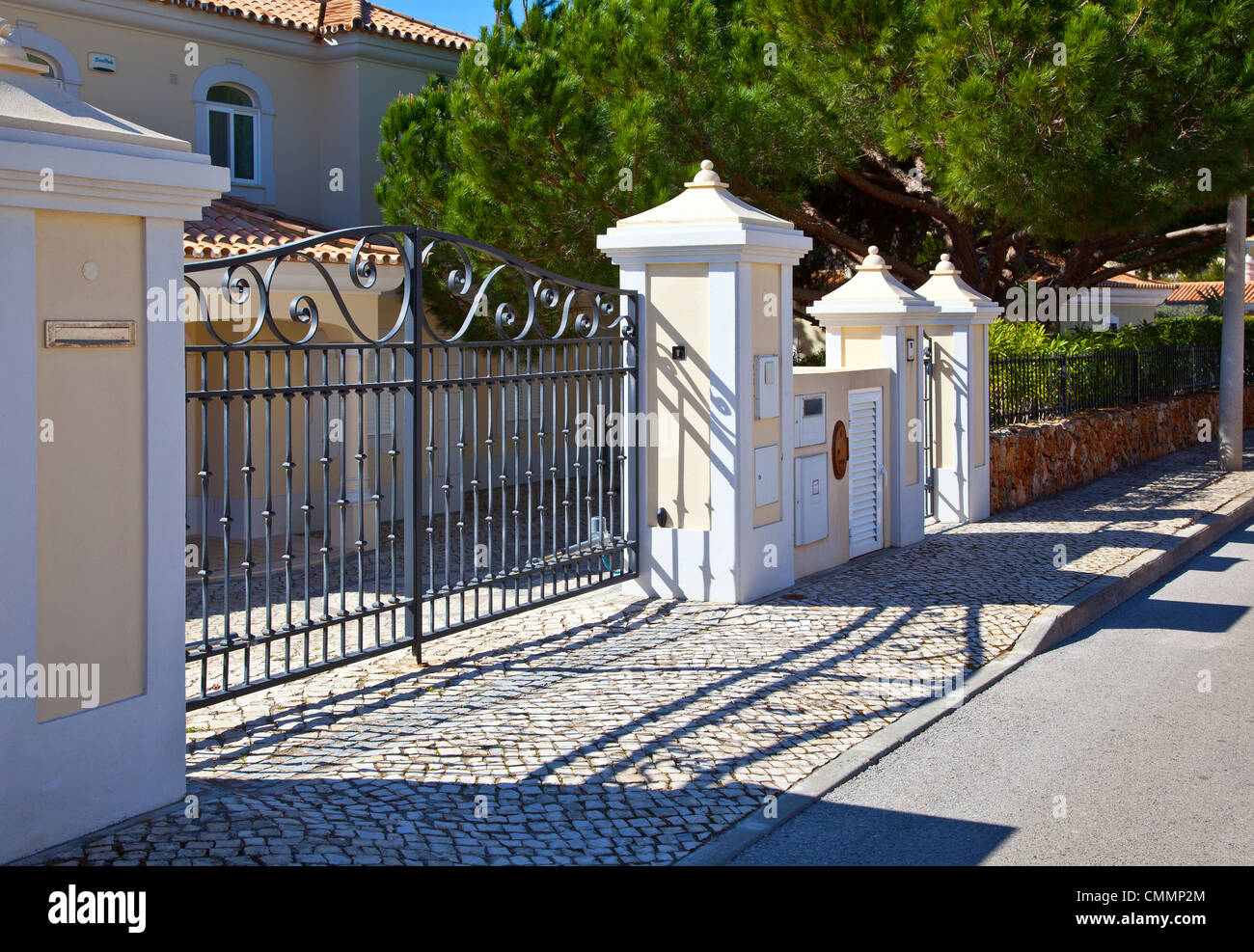 Luxury villa entrance iron gate hi-res stock photography and images - Alamy
