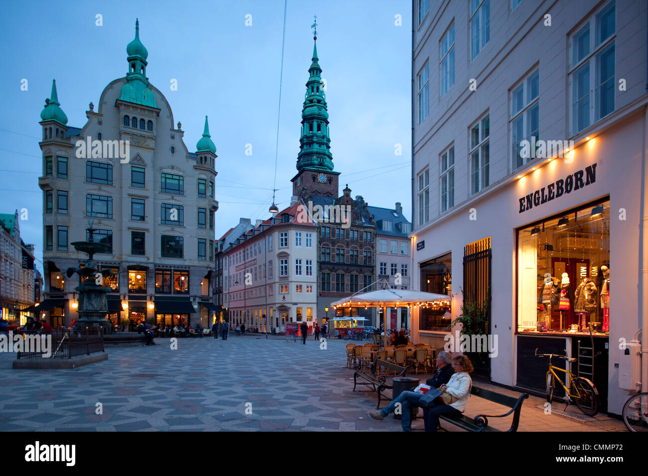 Nikolaj Church and restaurants at dusk, Copenhagen, Denmark, Scandinavia, Europe Stock Photo