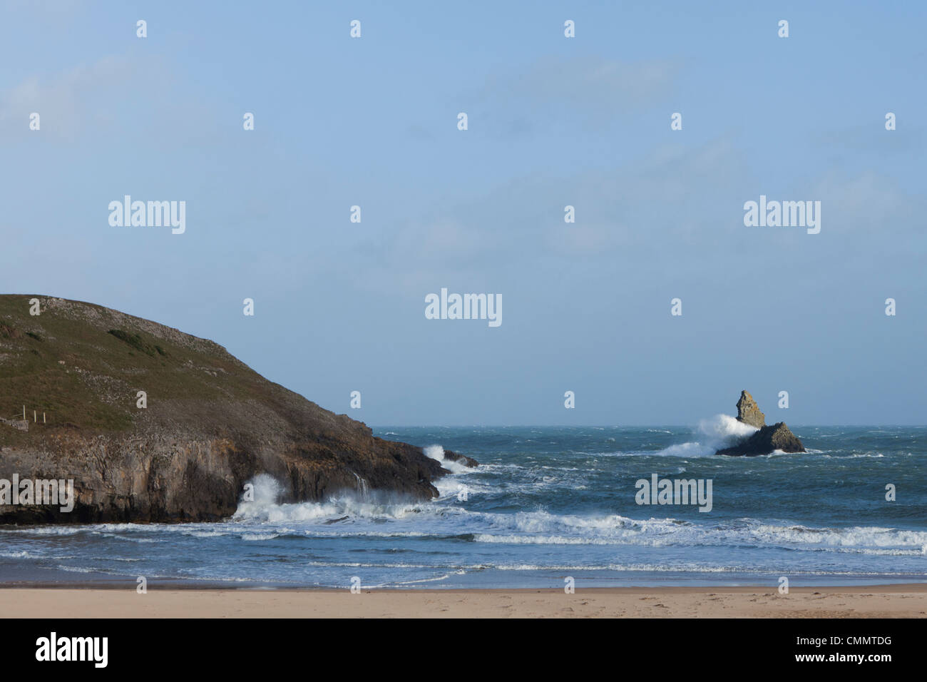 Large waves break over rocks at Broadhaven Beach, West Wales. Stock Photo