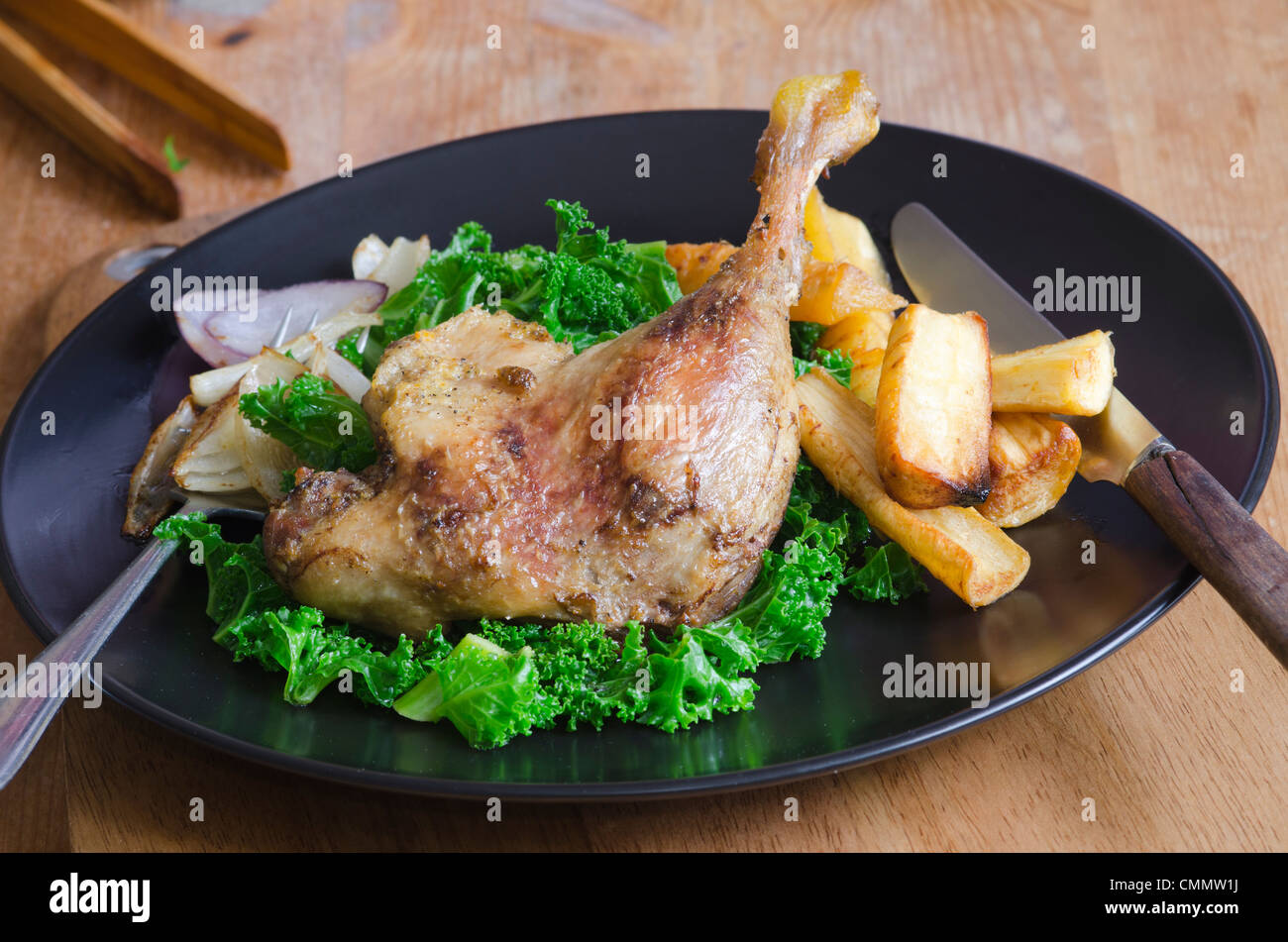 Roast duck legs Stock Photo - Alamy