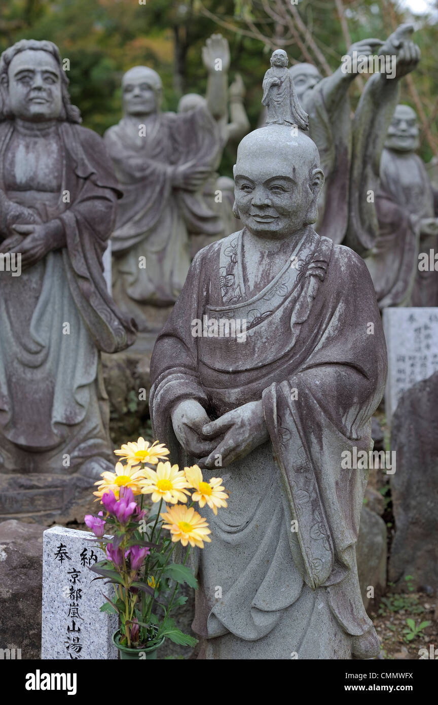 a lot of stone monk statues in Arashiyama, Kyoto, Japan Stock Photo Alamy