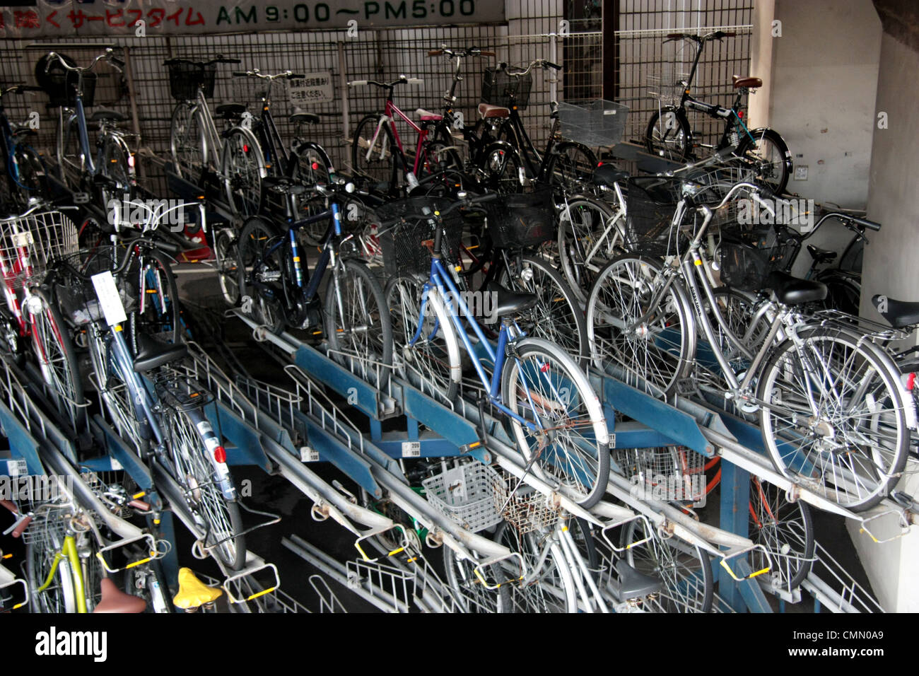 Indoor multistorey bicycle parking in Tokyo, Japan Stock Photo Alamy