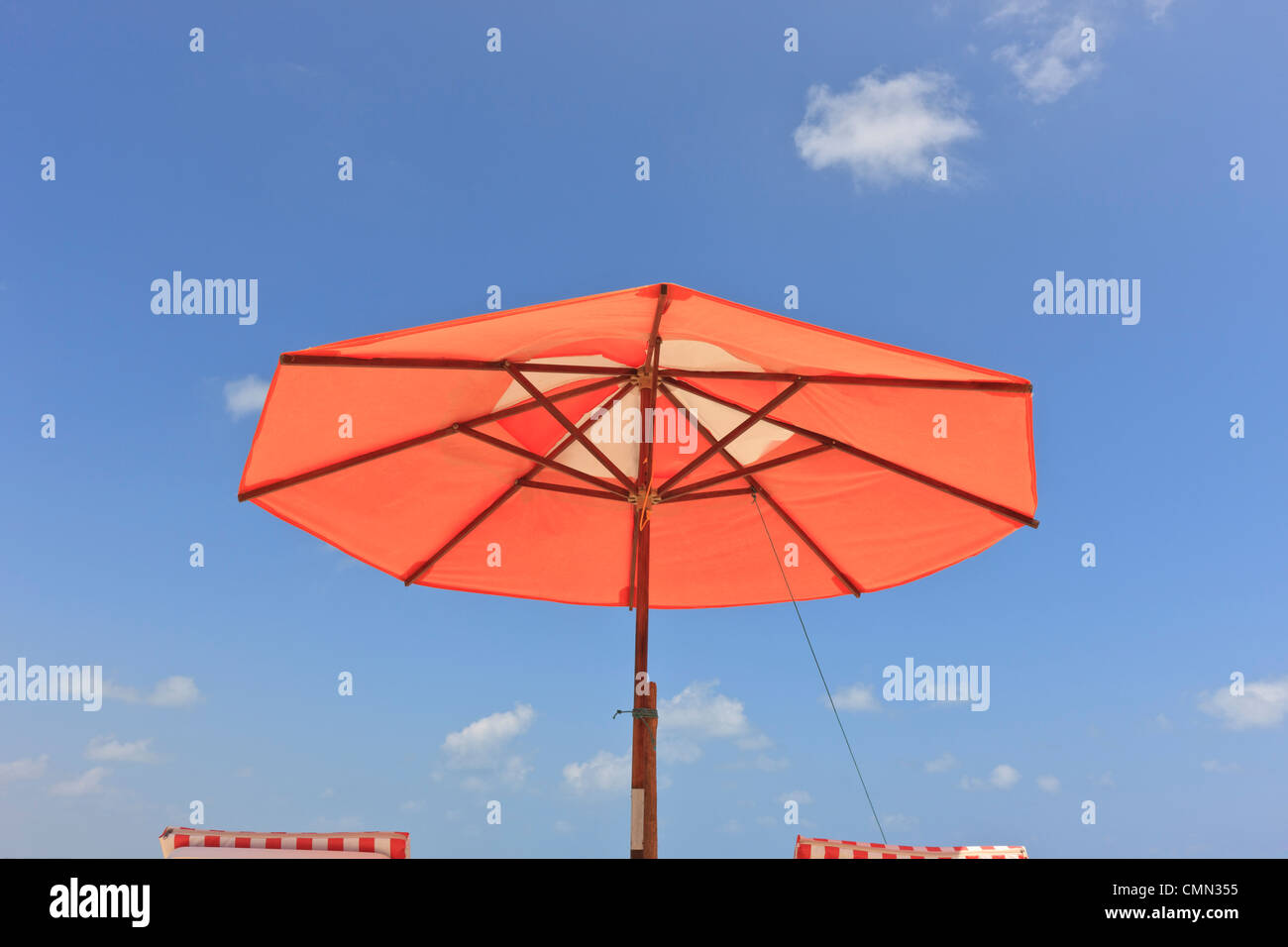 parasol, umbrella, sunshade, sun umbrella with beach chairs on beach, Brazil, Brasil Stock Photo