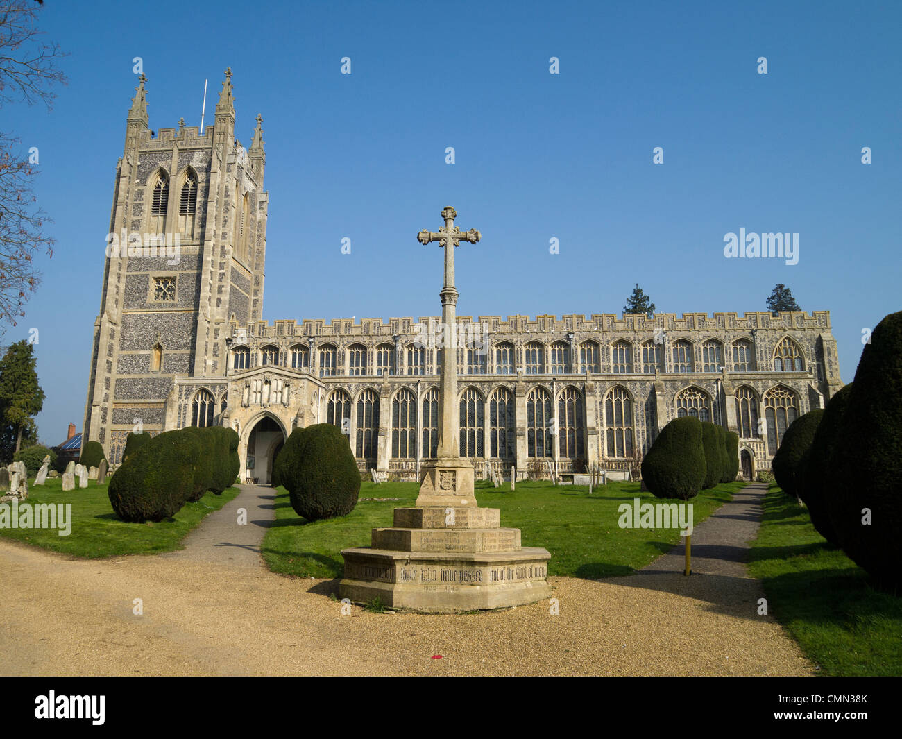 The War Memorial cross in front of All Saint's Church in Long Melford