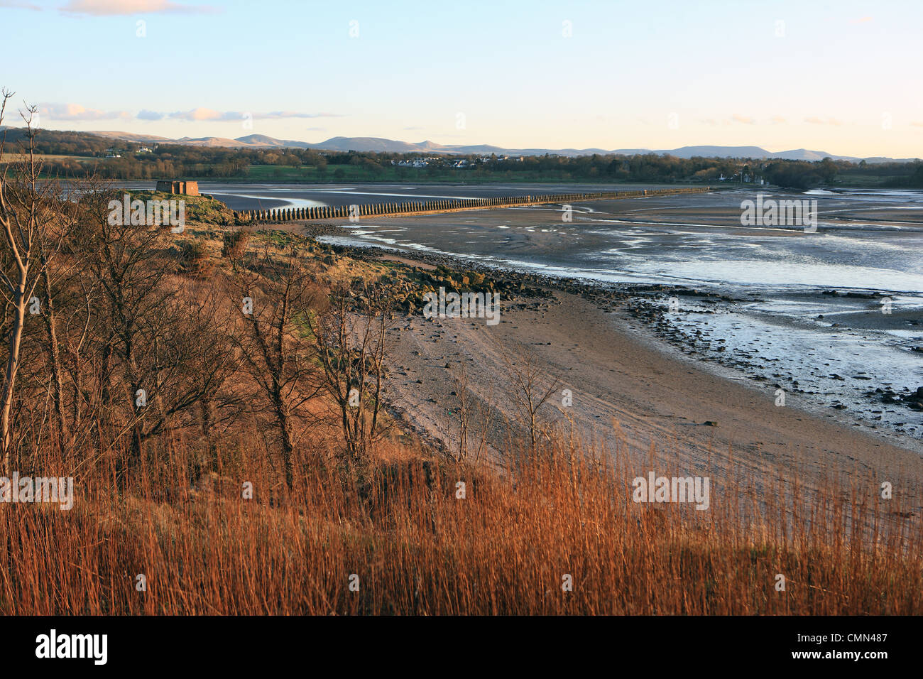 Beach on Cramond Island and defense fortifications along the causeway to Cramond at low tide Stock Photo