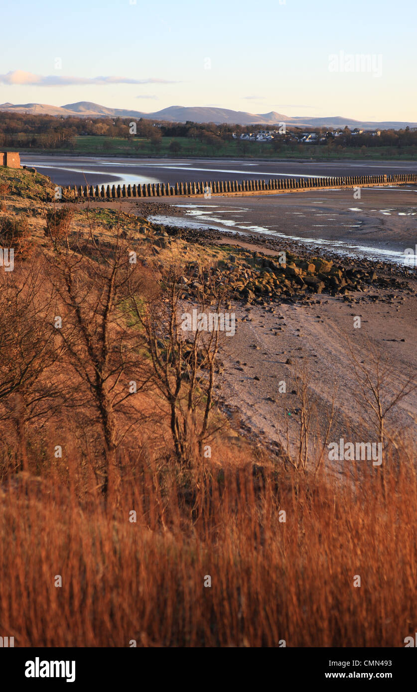 Beach on Cramond Island and defense fortifications along the causeway to Cramond at low tide Stock Photo