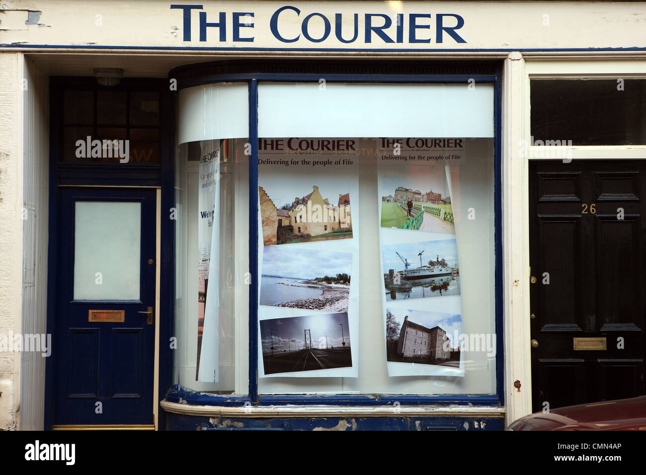 Local newspaper shop frontage for the Dundee based 'The Courier' in Dunfermline Stock Photo