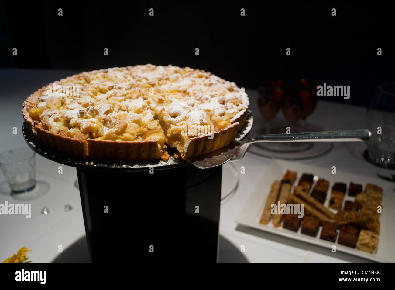A sweet pie on a plinth with a pie slicer/server Stock Photo
