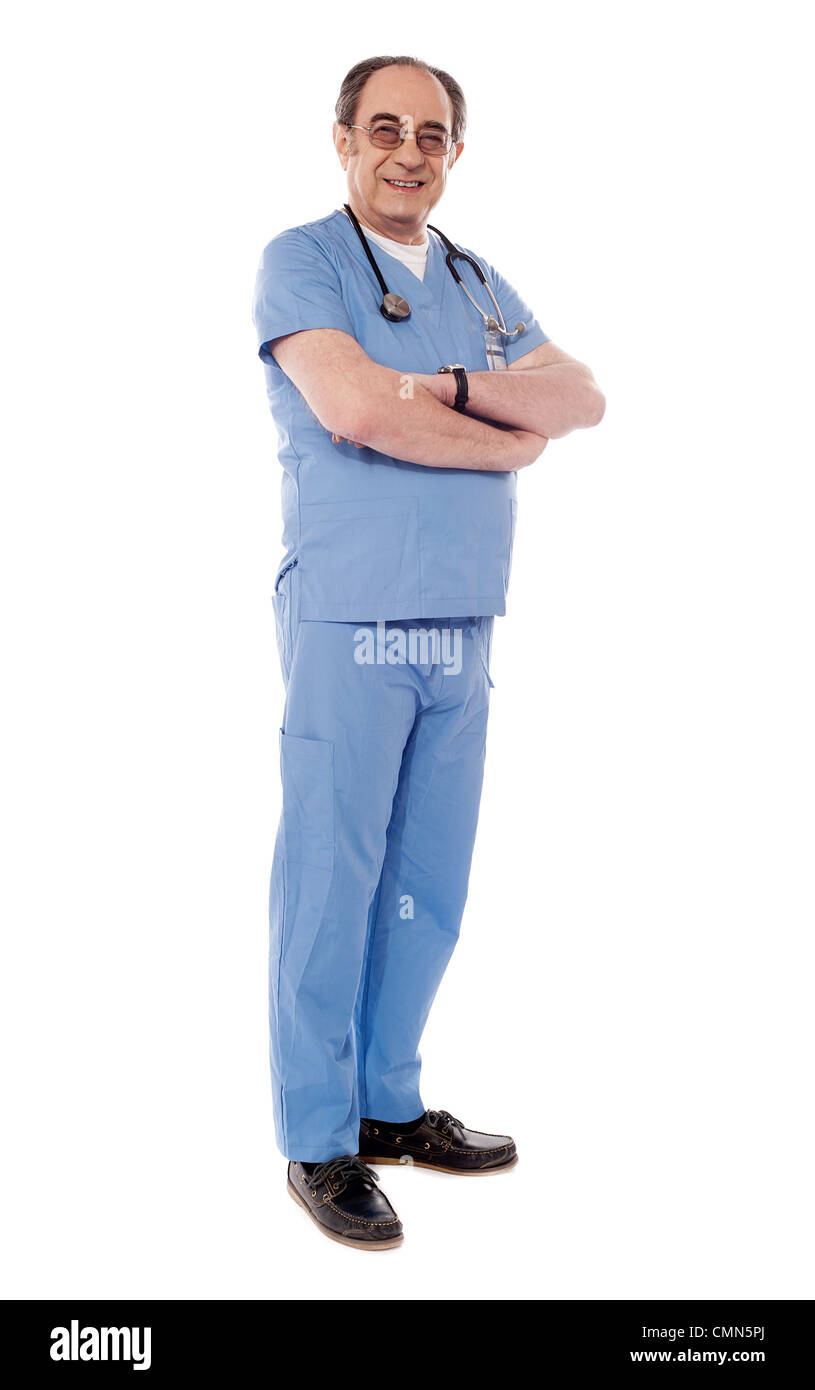 Aged medical professional posing with stethoscope around his neck looking at camera Stock Photo