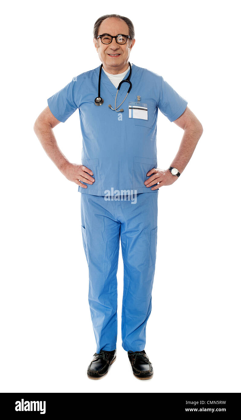 Full length view of smiling experienced medical professional posing hands are on his waist Stock Photo
