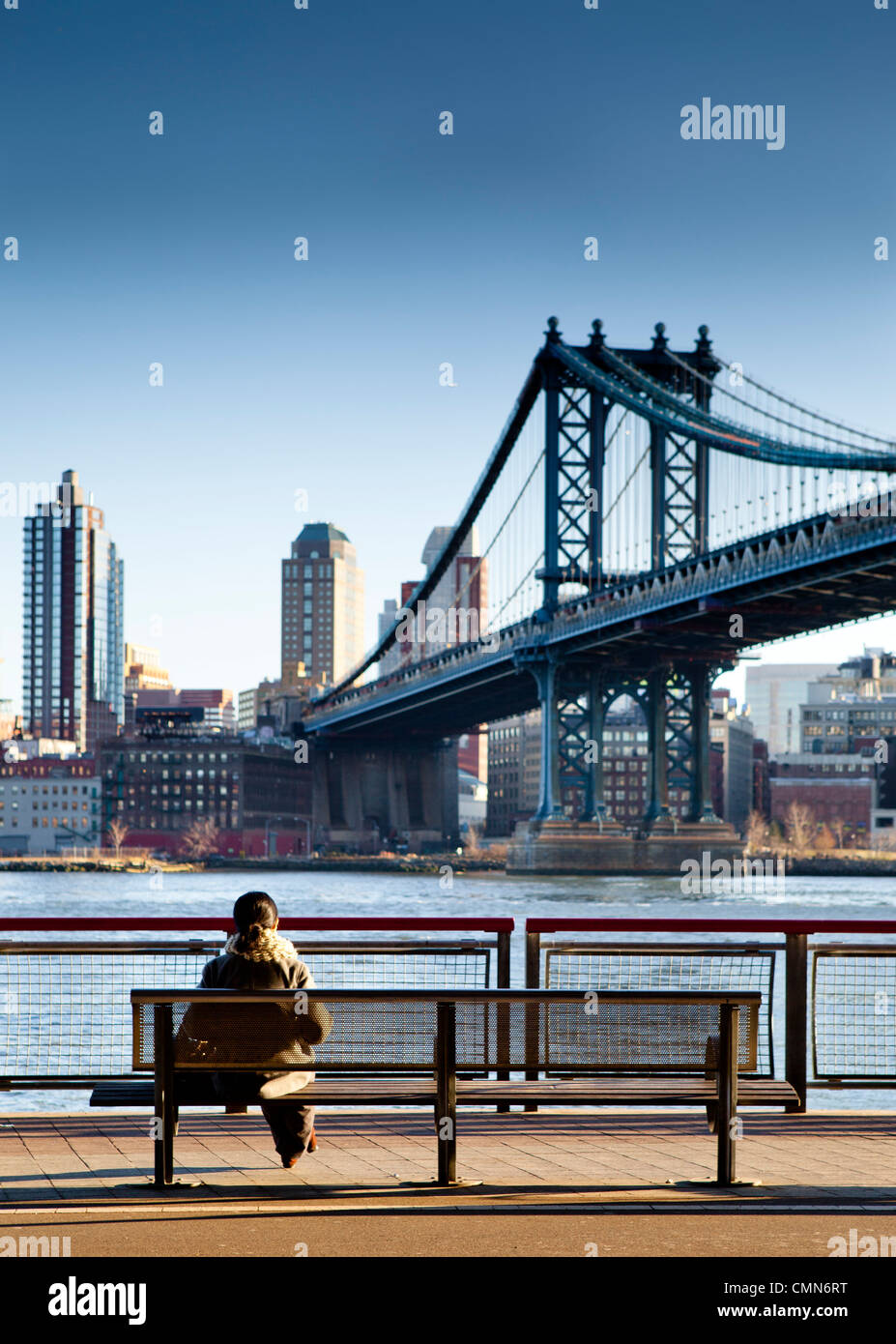 Girl sitting on suspension bridge hi-res stock photography and images ...