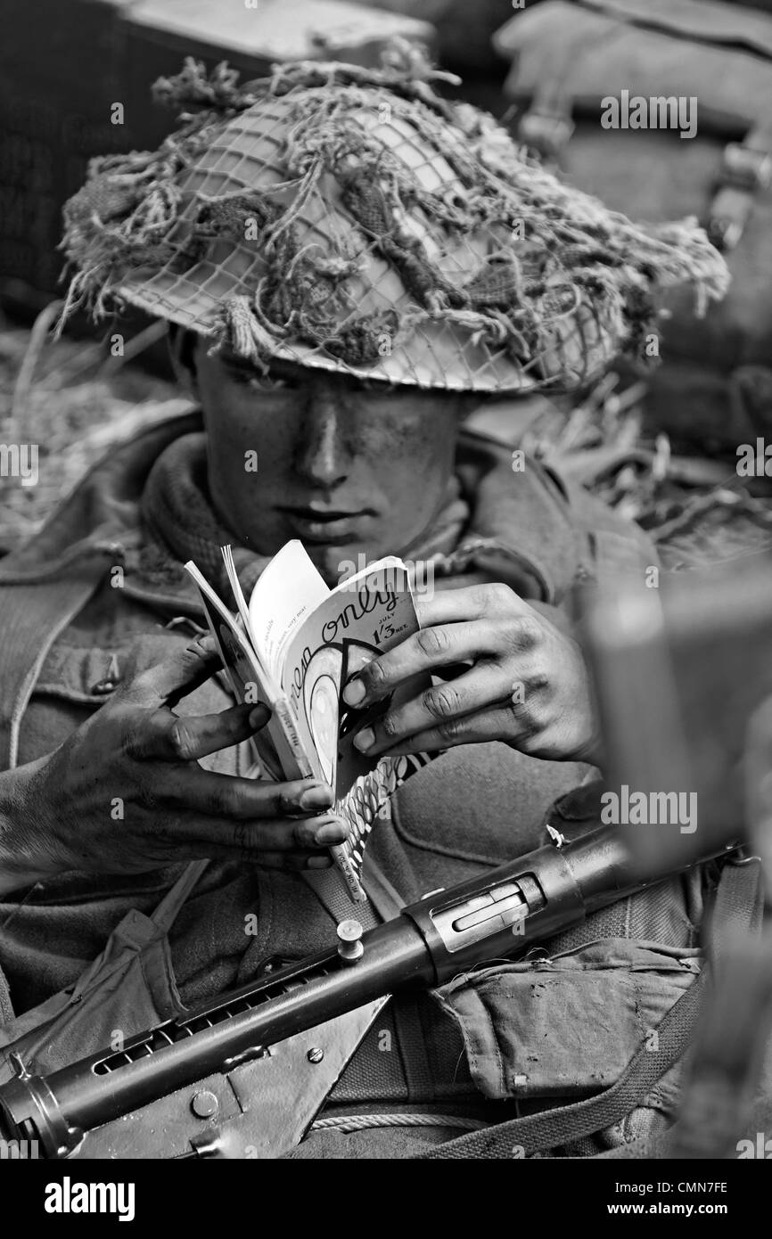 British Army Soldier (Looking to Camera) WW2 Reading Men Only July 1944