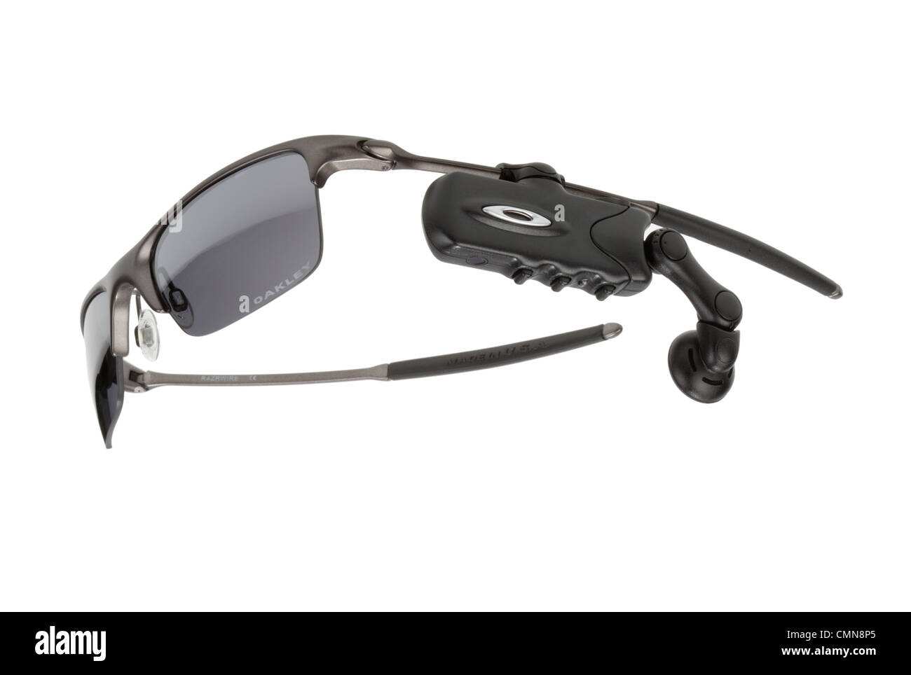 Speak and listen by bluetooth device on Oakley sunglasses Stock Photo