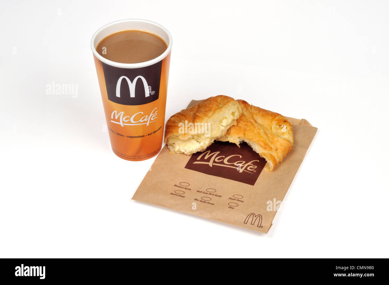 McDonald's cup of McCafe  coffee and cheese danish pastry on white background cut out USA. Stock Photo